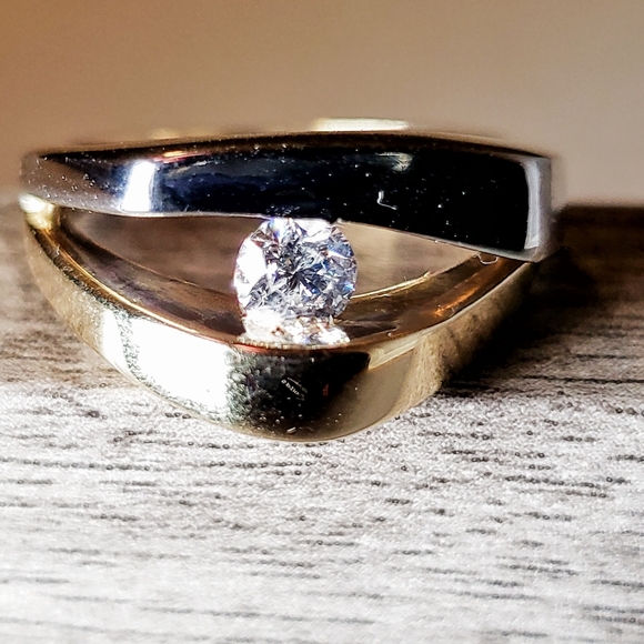 14kt tension set solitaire diamond ring. - Picture 2 of 7